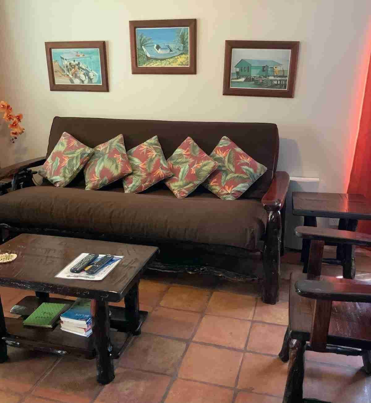 Logwood armchairs arranged around a matching center table
