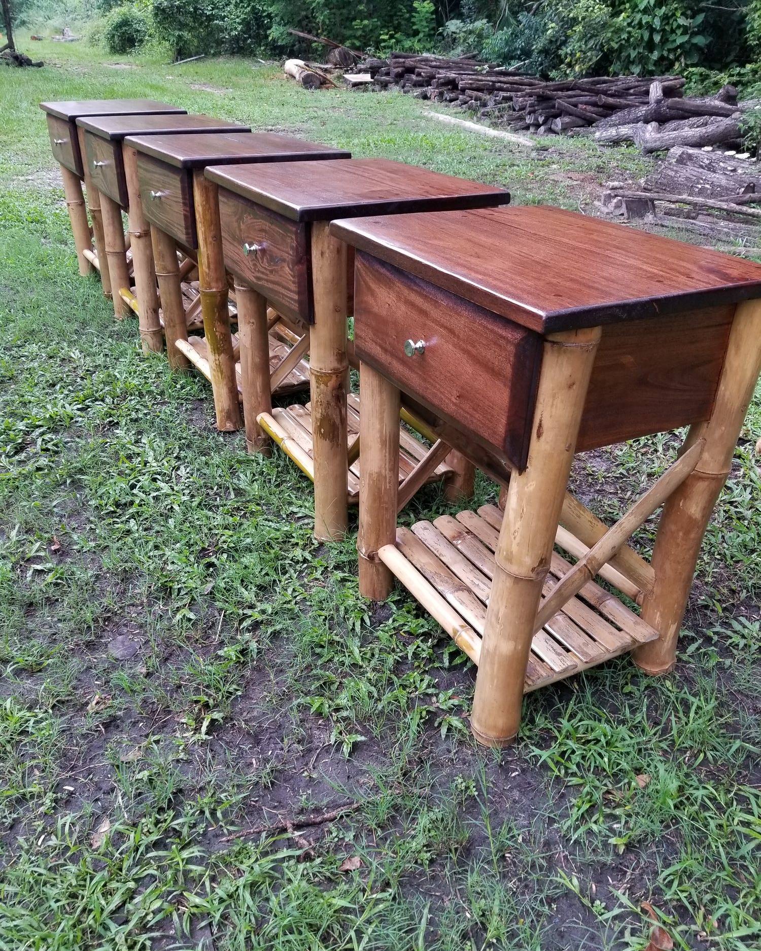 Row of matching nightstands with hardwood tops, drawers and bamboo legs