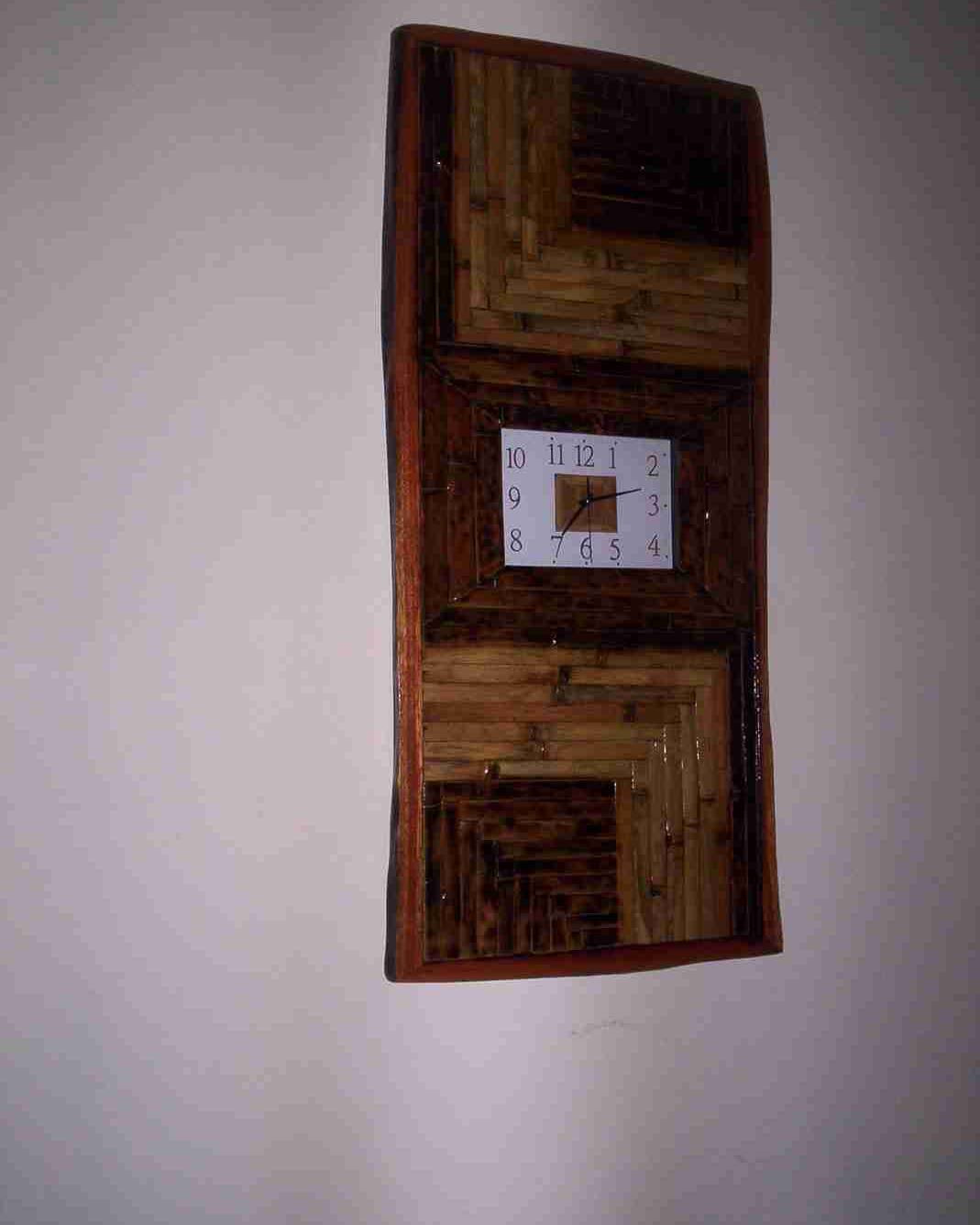 Tall wall clock set in a framed bamboo panel