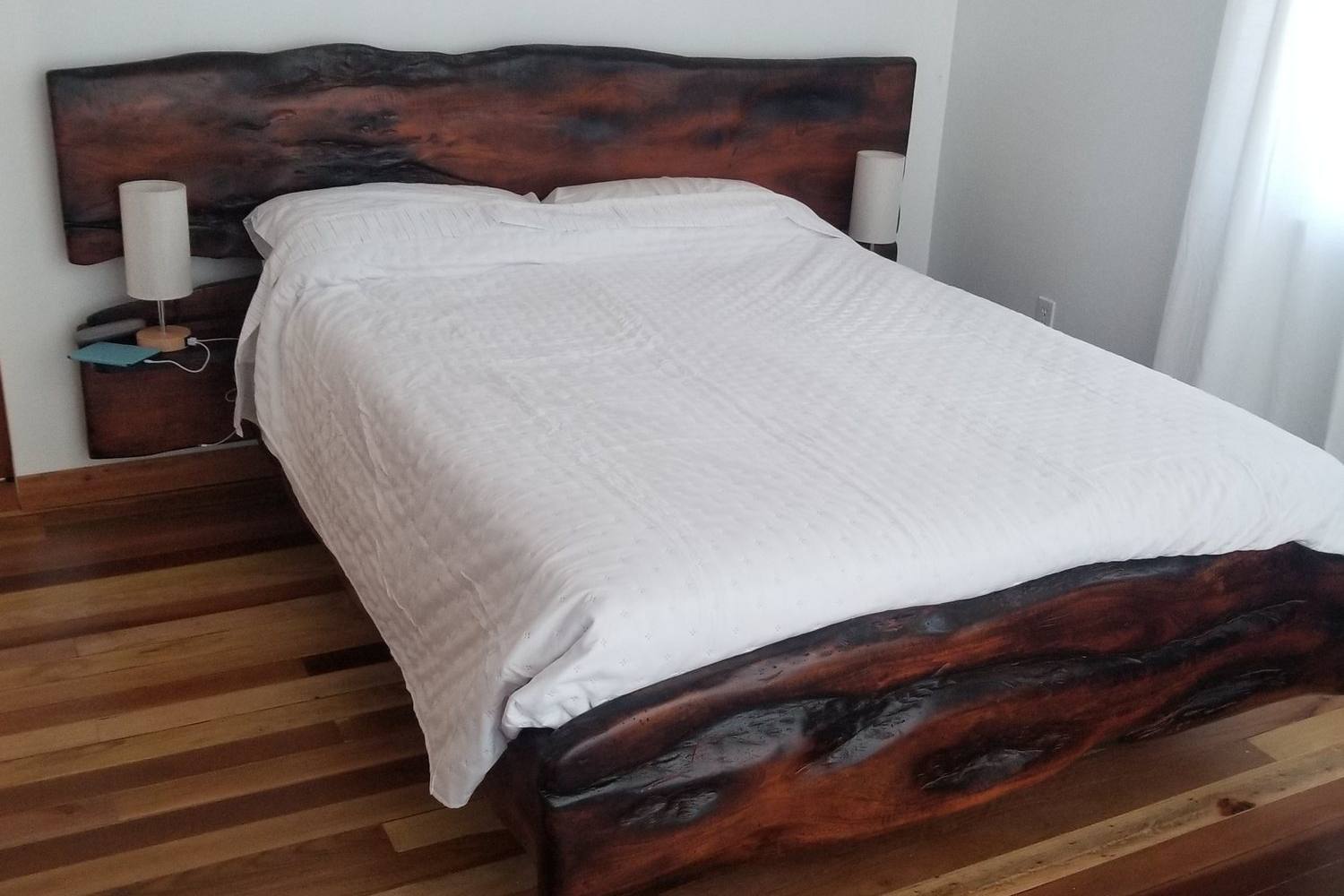 Custom bed with a live-edge hardwood headboard